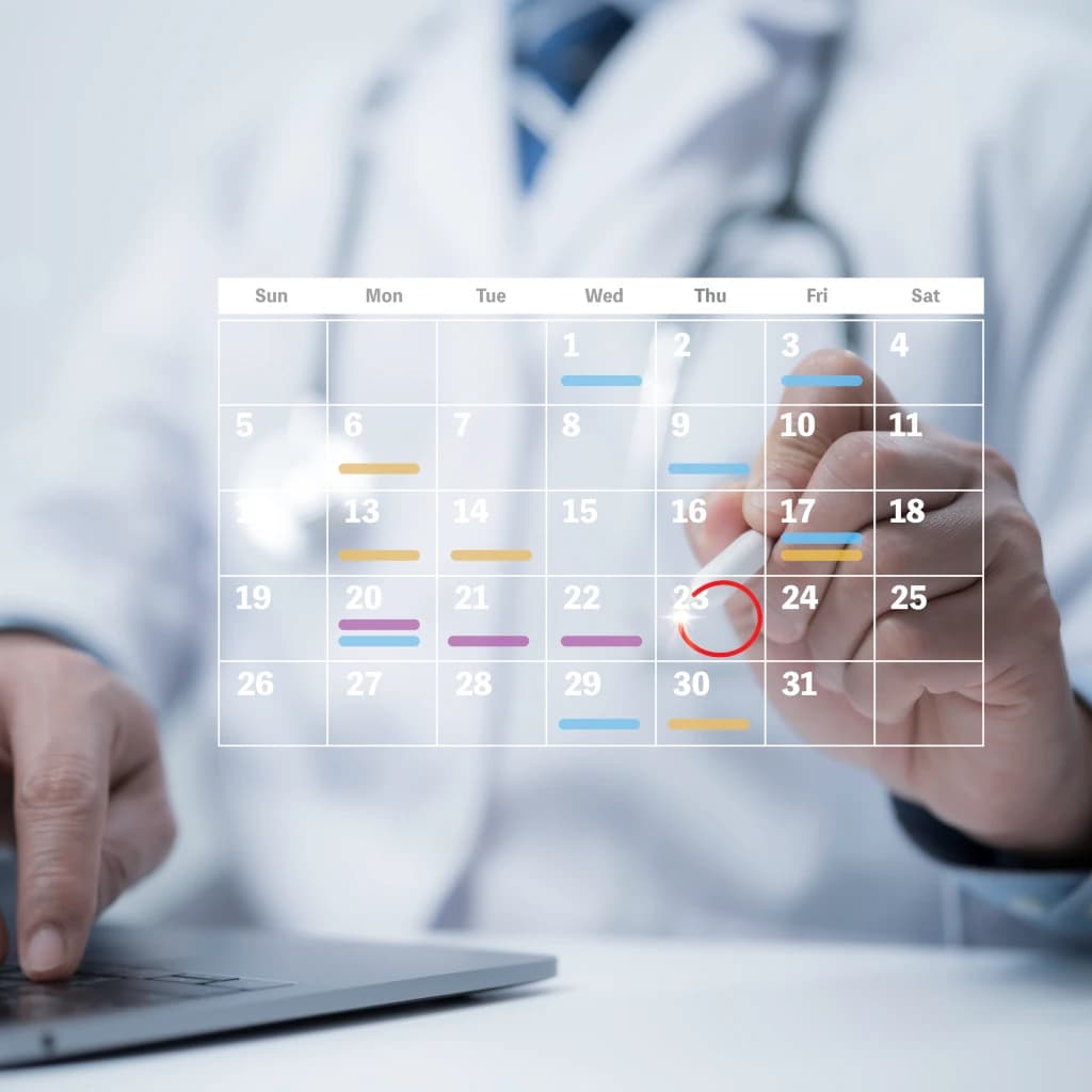 A doctor creating a hospital schedule.
